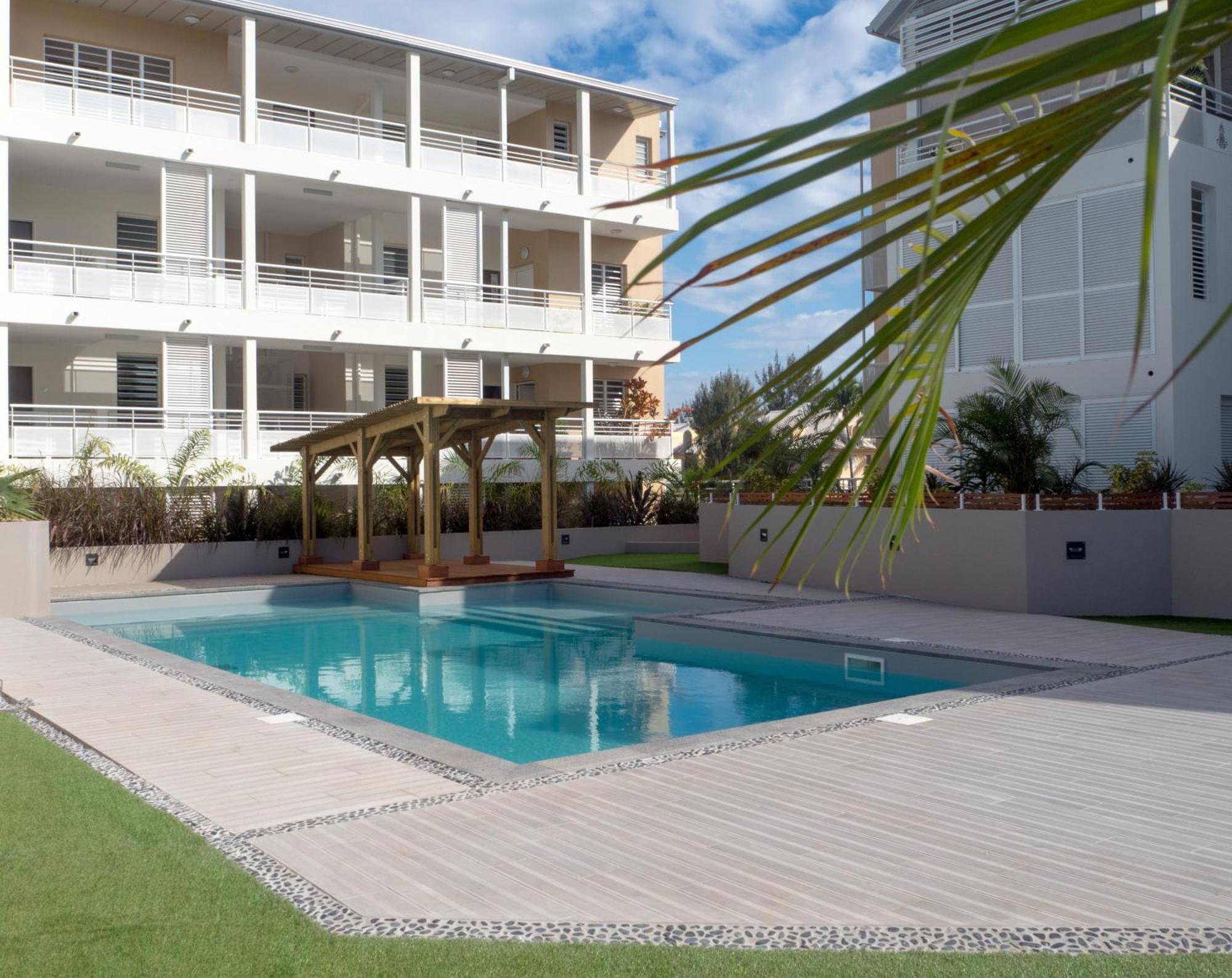 Apartamento Escale Tropicale, Appart Vue Mer A 2 Min Du Lagon Saint-Gilles-les-Bains Exterior foto
